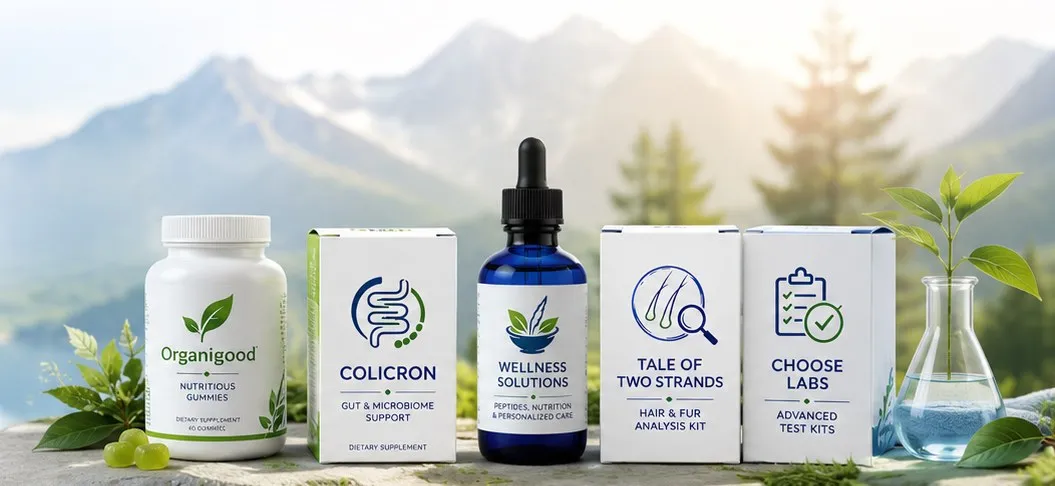 The Tower of Wellness product family — Organigood gummies, Colicron, Wellness Solutions, Tale of Two Strands and Choose Labs — arranged on a stone ledge above a mountain lake.