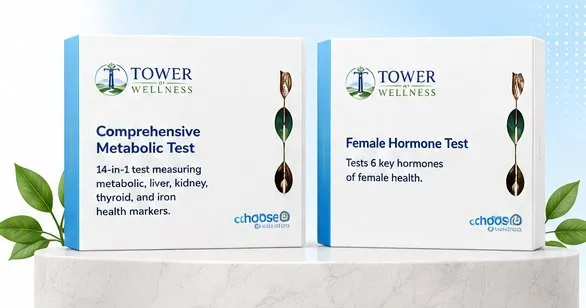 Two Choose Labs test kit boxes — Comprehensive Metabolic Test and Female Hormone Test — on a marble plinth.